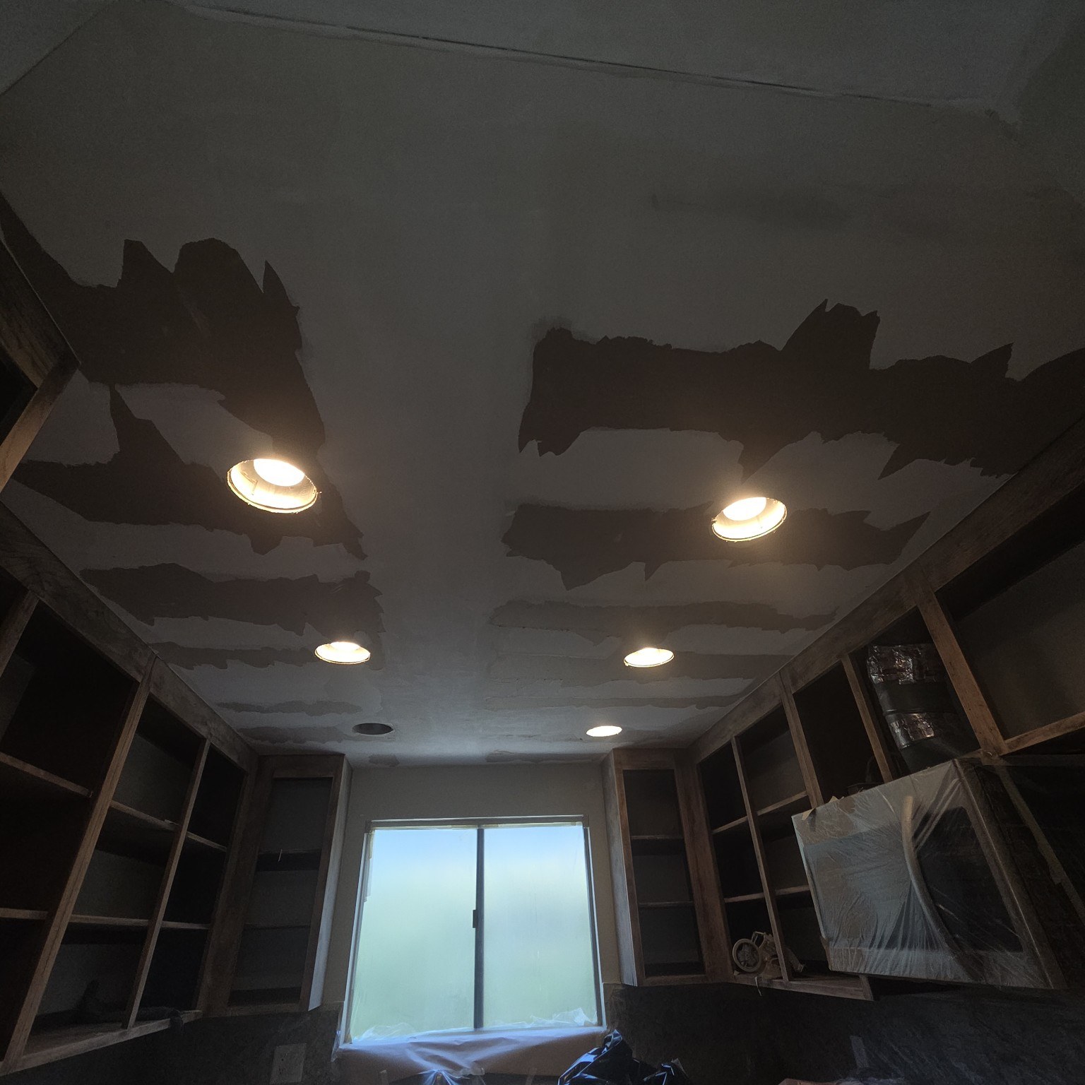 Ceiling drywall repair in progress